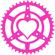 Pink bicycle gear with a heart in the center