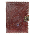 A Leather bound Dragon Journal with a raised dragon in the center