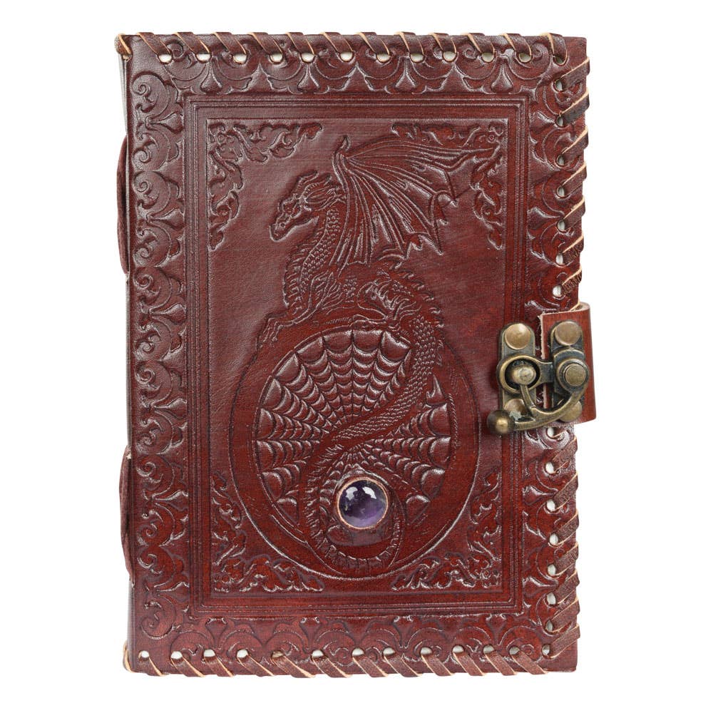 A Leather bound Dragon Journal with a raised dragon in the center