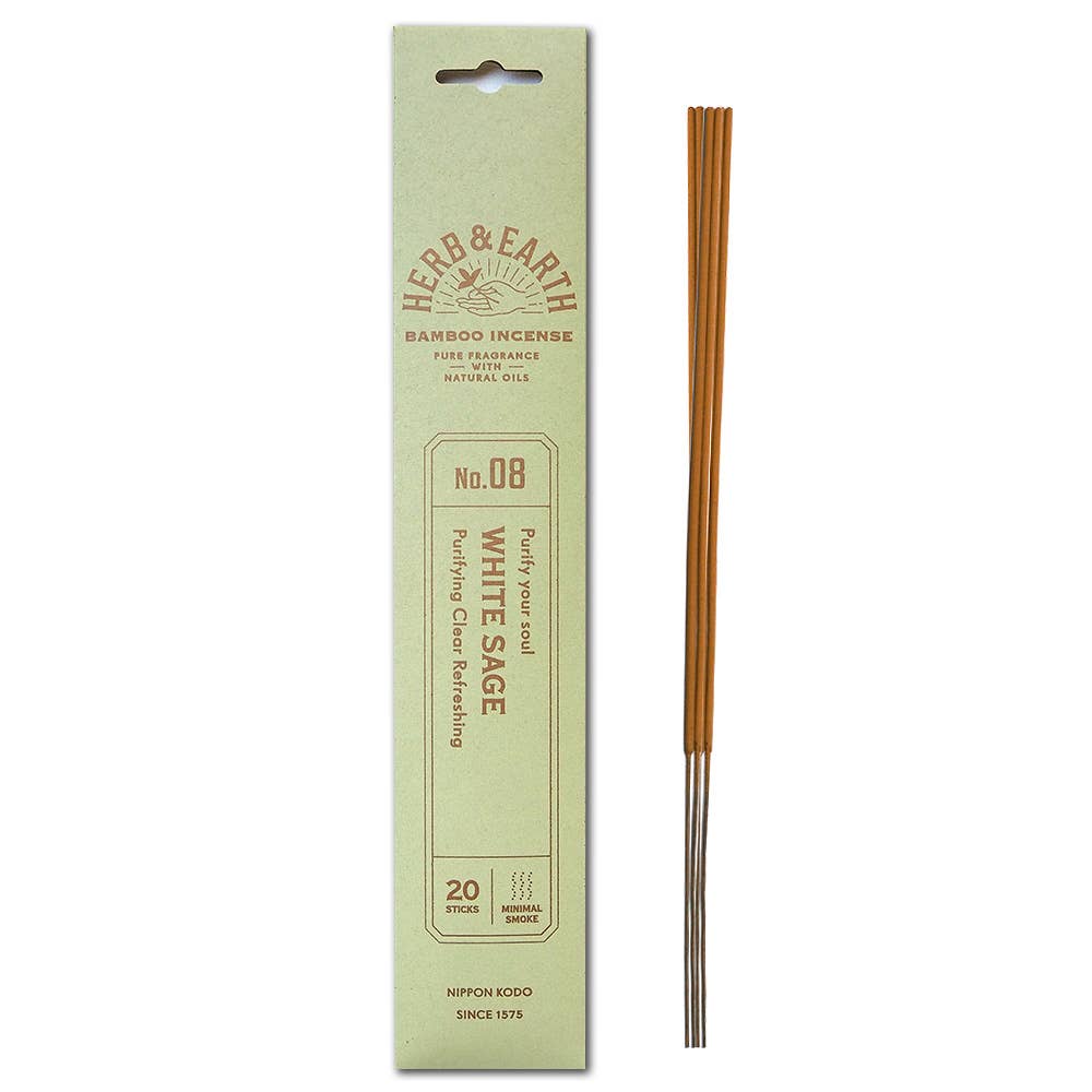 Bamboo incense sticks with their packaging on a white background