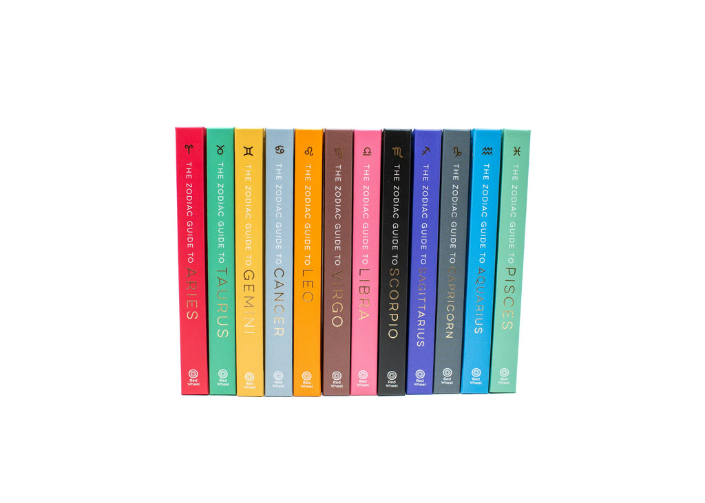 Set of books titled 'The Zodiac Guide to Astrology' by Astrid Carvel on a whitebackground.