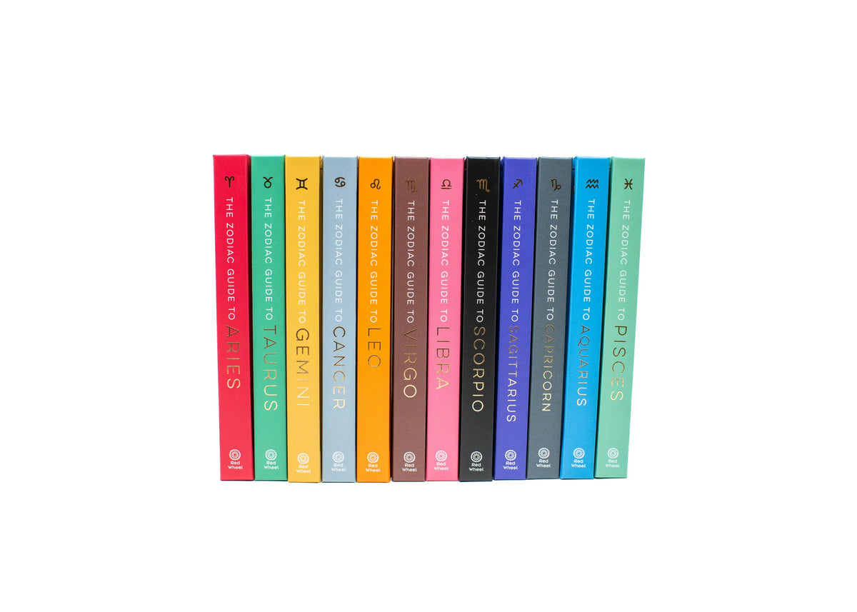 Set of books titled 'The Zodiac Guide to Astrology' by Astrid Carvel on a whitebackground.