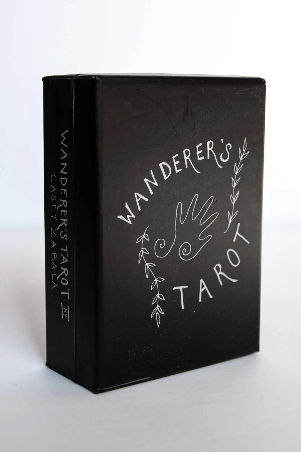 Black tarot card box with 'Wanderer's Tarot' text on a white background