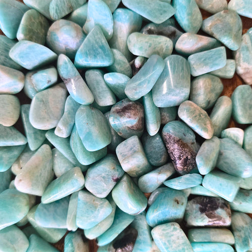 A pile of amazonite tumbles 