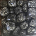 A pile of tumbled larvakite 