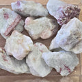 A pile of raw pink tourmaline chunks