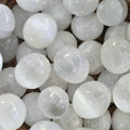 A pile of Tumbled oval Selenite crystals