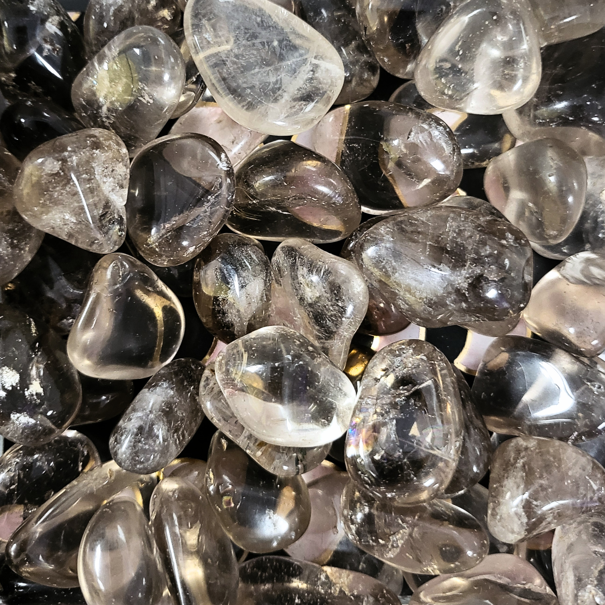 A pile of tumbled smoky quartz